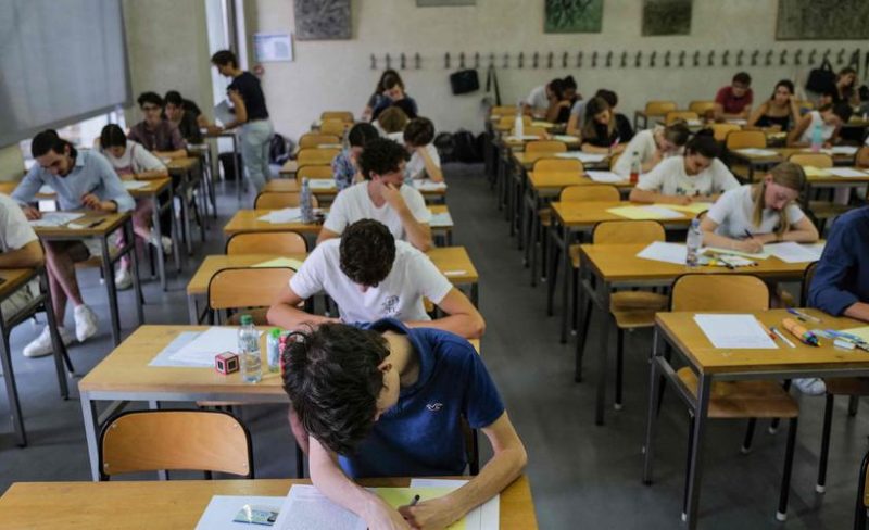 Pupils start the philosophy test as part of the baccalaureat exams at the Sainte-Marie Les Maristes high school designed and built by famous architect Georges Adilon, in Lyon, central-eastern France, on June 15, 2022. (Photo by OLIVIER CHASSIGNOLE / AFP)